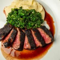 Sliced Steak · With sauteed spinach and mashed potato, port wine sauce.