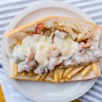 The Julie · Chicken cutlet, with melted mozzarella cheese, bacon, fries & gravy on a hero
