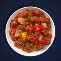 Veggie Dominance Manchurian · Vegetables cooked with yoghurt and baked in a tandoor clay oven.