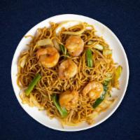 Simple Shrimp Hakka Noodles · Indo-Chinese fried noodles cooked with shrimp, soya sauce, chili sauce and chili vinegar.