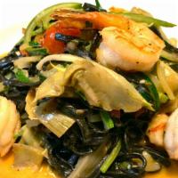 Black Ink Linguine With Shrimps And Artichokes · Black ink linguine with shrimp, artichokes and zucchini in cherry tomatoes and garlic olive ...
