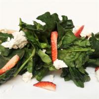 Spinaci Con Caprino E Fragole · Fresh spinach salad with goat cheese, toasted almond and strawberry.