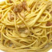 Spaghetti Alla Carbonara · Spaghetti in egg and pancetta (guanciale) sauce.