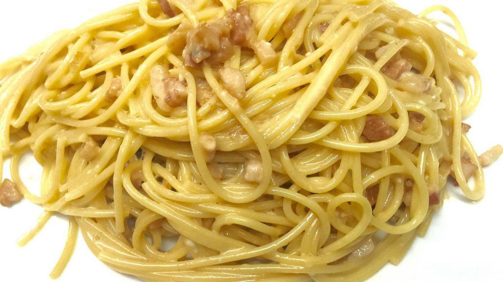 Spaghetti Alla Carbonara · Spaghetti in egg and pancetta (guanciale) sauce.