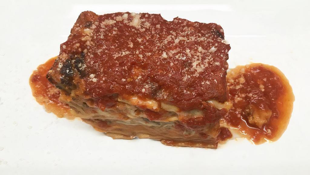Lasagne All'Emiliana · Homemade lasagna with meat sauce.