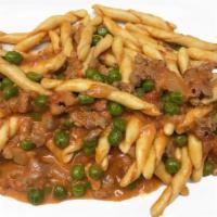 Fusilli Alla Buttera · Fresh fusilli pasta with sweet and hot sausages, sweet peas in a light cream and tomato sauce.