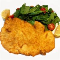 Chicken Milanese · Breaded chicken breast cutlet served with tomato and
arugula salad.