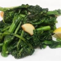 Broccoli Al Salto · Sauteed broccoli rapa in garlic and olive oil.