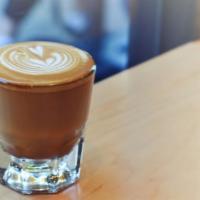 Cortado · Just the right amount of espresso and steamed milk to hit those taste buds and get you moving.