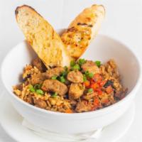 Jambalaya · Traditional Louisiana style- rice dish served with chicken, andouille sausage and Cajun spic...
