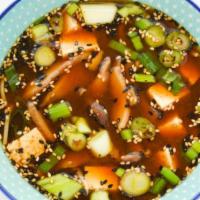 Miso Soup · Miso paste, tofu, scallions, and buckwheat noodles.