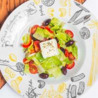 Greek Salad · Lettuce, tomato, onion, cucumber, feta cheese, mixed olives.