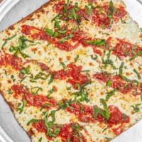 Grandma Pizza · A thin crust, pan-backed pizza with a whole peeled tomato sauce made with garlic and basil a...