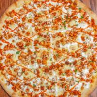 Buffalo Chicken Pizza · Tender chicken pieces marinated in a homemade buffalo sauce, spread out over blue cheese.