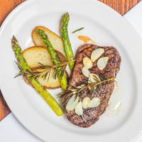 New York  Steak Grilled  · Steake with rosted potatoes and asparagus