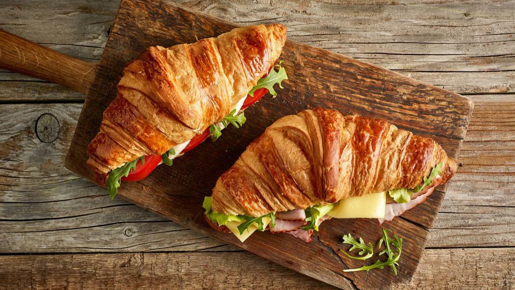 Build Your Croissant Sandwich · Buttery and flakey croissant filled with whatever you desire!