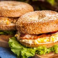 Bagel With Two Eggs & Bacon · Fresh baked bagel with fresh eggs and crispy bacon.