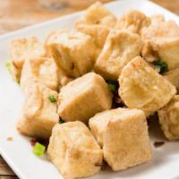 Salt & Pepper Tofu 椒盐豆腐 · Battered fried tofu tossed with chopped fresh peppers, seasoned with salt and pepper