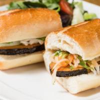Veggie Banh Mi 烧鸡越南面包 · Tempeh, pickled daikon, carrots, cucumbers and cilantro with spicy mayo (Spicy)