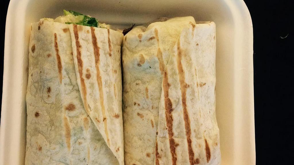 The Classic Caesar Wrap · 6 oz. grilled chicken breast, romaine lettuce, turkey bacon, cucumber, parmesan cheese and Caesar dressing. Recommended on a plain tortilla. Gluten-free with bowl option.
