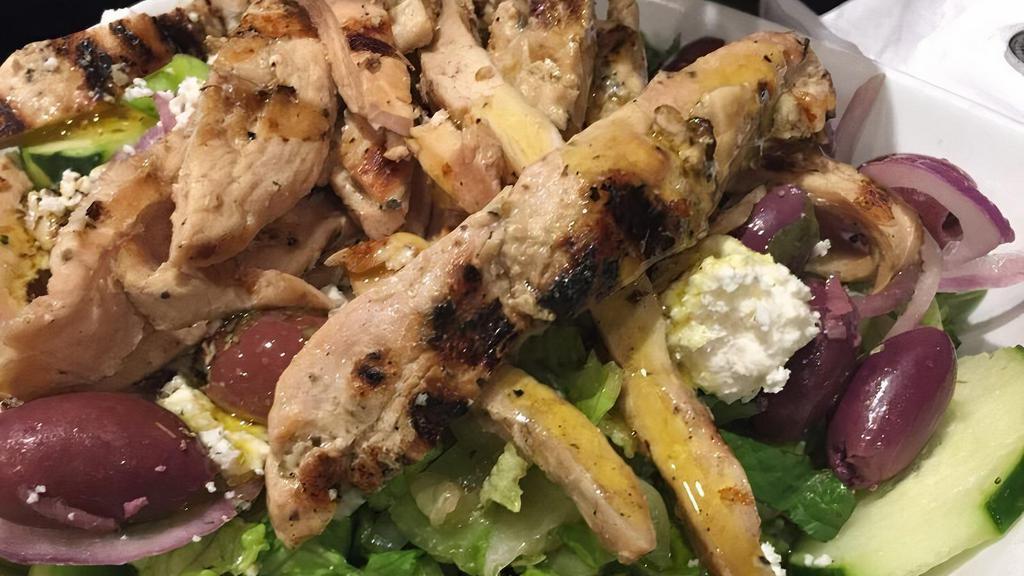 Greek Salad · Romaine lettuce, tomato, cucumber, onion, kalamata olive, feta cheese served with oil and vinegar dressing.
