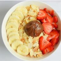 Nutella  · Almond Milk, Bananas, Acai, Nutella, Peanut Butter. Topped with Toasted Sliced Almonds, Bana...
