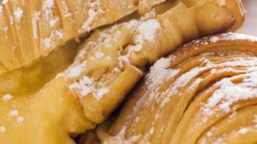 Custard Cream Croissant · 1 piece; buttery layered pastry