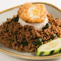 Kai Ra-Berd (Egg Bomb) · Spicy. Stir fried ground pork with chili-garlic and basil leaves served over rice and topped...