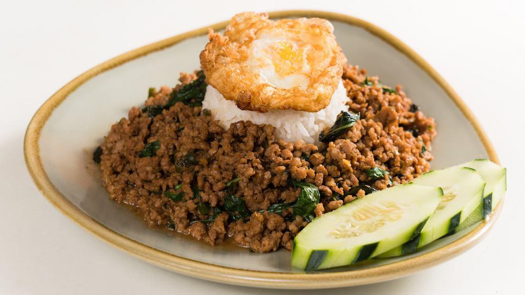 Kai Ra-Berd (Egg Bomb) · Spicy. Stir fried ground pork with chili-garlic and basil leaves served over rice and topped with fried egg.