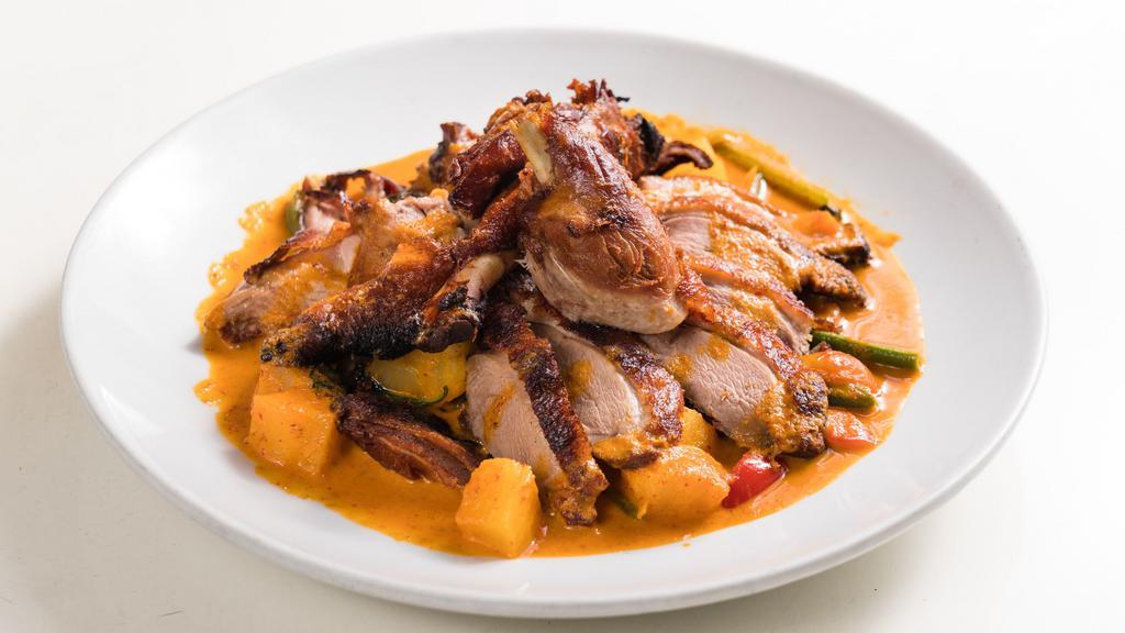 Pineapple Duck Curry · Spicy. With pineapple coconut curry, cherry tomato, string bean, bell pepper, and basil.