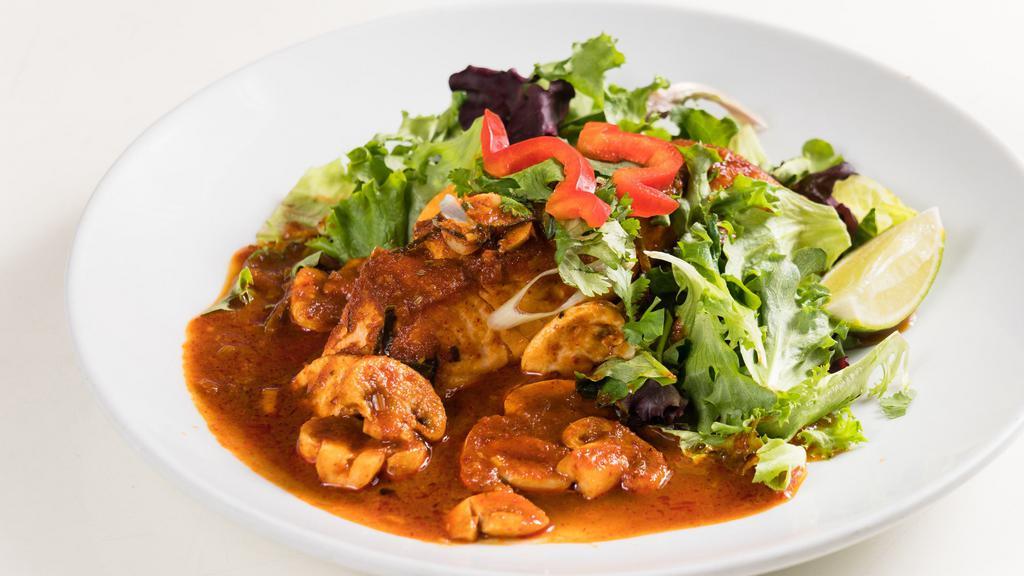 Salmon Lemongrass · Gluten-free. Spicy. Pan-seared salmon topped with spicy mushroom lemongrass sauce and green salad.