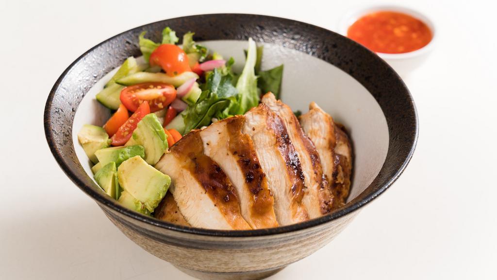 Chicken Rice Bowl · Grilled marinated chicken breast, sweet chili sauce, avocado, mixed salad, edamame, and brown rice.