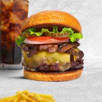 Must Be Mushroom Burger  · Seasoned half-pound American beef patty perfectly cooked to medium, topped with topped with ...