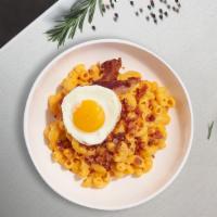 Bacon Break Mac  · The classic creamy mac and cheese cooked with bacon and topped with a fried egg.