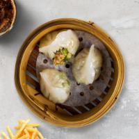 Chicken Dumplings  · Six pieces of chicken dumplings, served with dumpling sauce.
