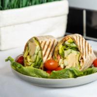 Vegan Wrap · Hummus, romaine, tomato, red and green peppers, cucumber and avocado. Served on a whole whea...