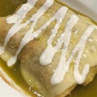 Enchiladas Suizas · Lettuce, tomato, onion, cilantro, Mexican cheese, rice, beans and cream, chicken or cheese.
