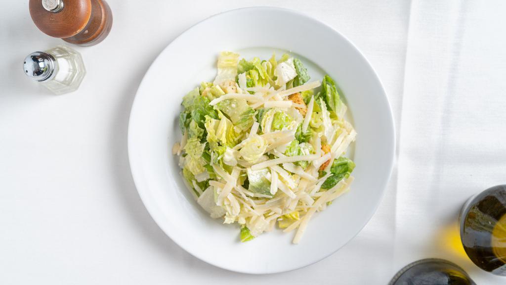 Cesare Insalate · Romaine, homemade croutons, shaved Parmesan, and classic Caesar dressing.