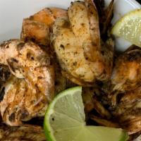 (8)Jumbo Jerk Shrimp  Dinner · Served with Rice and Peas And Steamed Vegetables