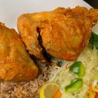 Medium Fried Chicken Dinner · Served with your choice of the following: Rice and Peas and steamed vegetables