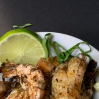 12 Jumbo Jerk Shrimp Dinner · Served with Rice and Peas And Steamed Vegetables