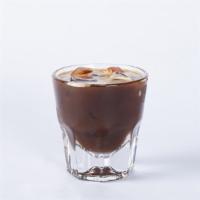 Espresso Over Ice · Two shots of freshly roasted espresso over ice (4oz).