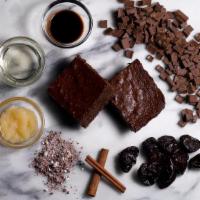 Brownie (V/Gf) · Vegan and gluten-free. Dark chocolate chunk brownie.