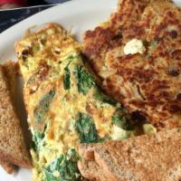 Florentine Omelette · Spinach and feta cheese. Served with home fries and toast. Omelette made with three eggs.