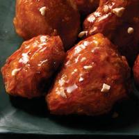 Gang-Jeong Wings
 · A soy sauce derived sauce with hints of cinnamon garnished with chilis to give a light spicy...