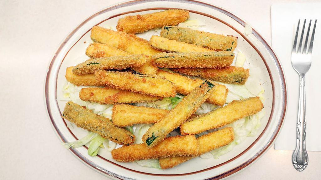 Zucchini Fries · Fried julienne zucchini.