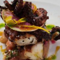 Grilled Octopus · With “gigante beans marinati” and spicy limoncello vinaigrette.