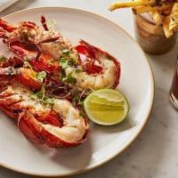 Maine Lobster Roasted In The Shell · With herb butter, French fries and lemon.