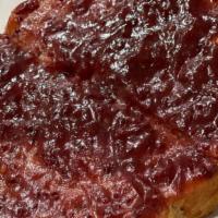 Butter + Jam Toast · Seasonal house made jam on thick sourdough.