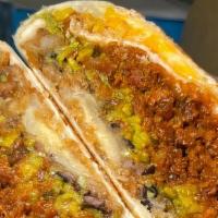 Bandito Burrito · Chorizo, Black Beans, Rice, Onion Rings, Guac, Mexican Cheese. (Pictured as Crunchwrap +$2)
...